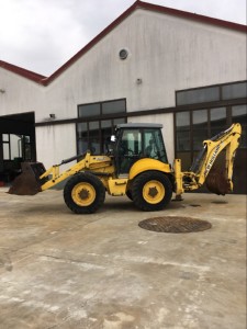 Rovokopač/kombinirka NEW HOLLAND B 115B
