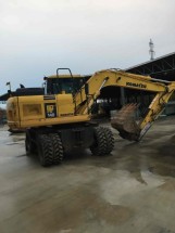 Bager Komatsu PW140-7